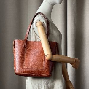 Handmade leather braided tote bag